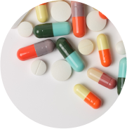 colourful medication capsules set on a white background