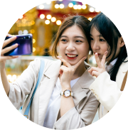Two young women posing while taking Systane selfie