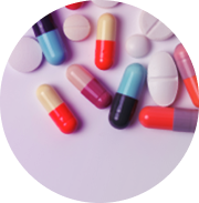 Colorful medication capsules set on a light background