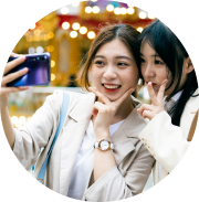 Two young women posing while taking Systane selfie