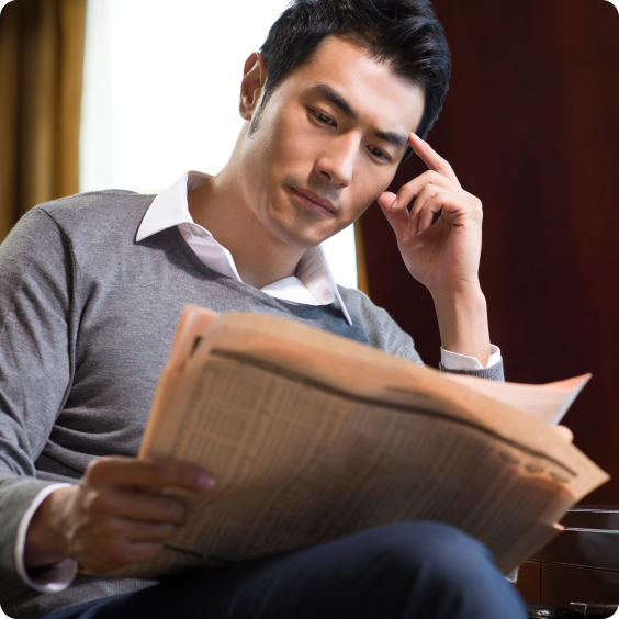 A man reading a newspaper